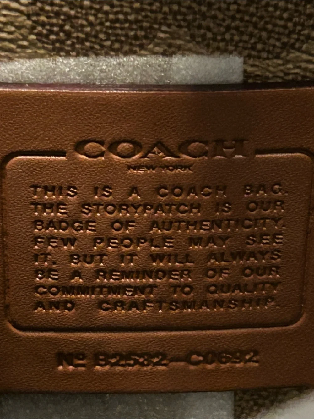 Coach Brown Leather Tote with Black Handles